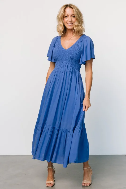 Velvet midi dresses in jewel tones for a glamorous winter event Scarlett Smocked Dress | Blue Velvet midi dresses in jewel tones for a glamorous winter event Scarlett Smocked Dress | Blue