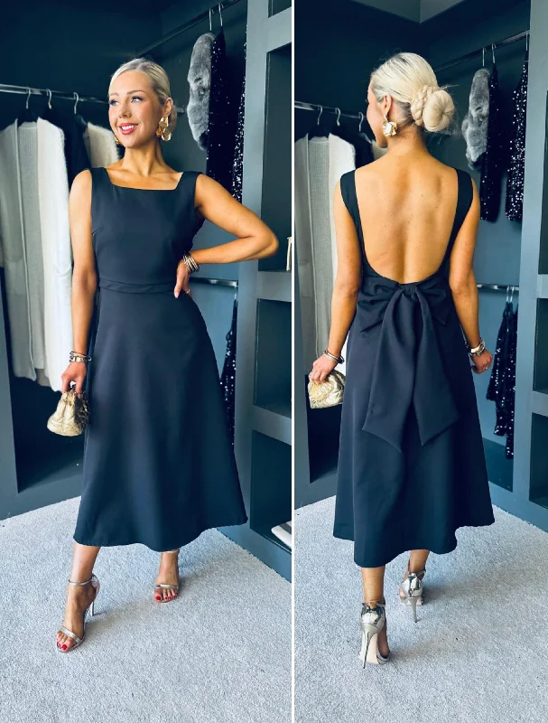 Midi dresses with pleated skirts for a timeless and elegant appeal Antoinette Bow Detail Midi Dress Black Midi dresses with pleated skirts for a timeless and elegant appeal Antoinette Bow Detail Midi Dress Black