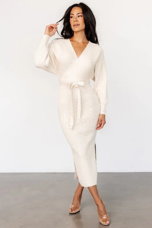 Midi dresses with V - necklines for a flattering and elongating effect Sammi Faux Wrap Dress | Cream Midi dresses with V - necklines for a flattering and elongating effect Sammi Faux Wrap Dress | Cream