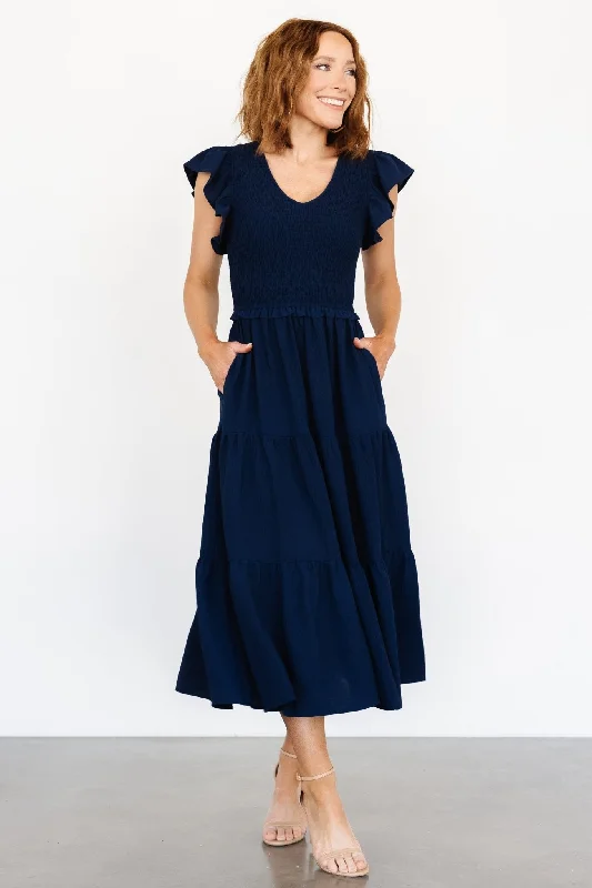 Midi dresses with bow accents for a sweet and charming look Afton Smocked Tiered Dress | Navy Midi dresses with bow accents for a sweet and charming look Afton Smocked Tiered Dress | Navy