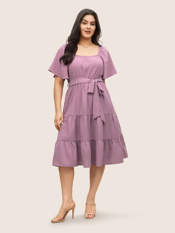 Midi dresses with ribbed textures for a unique and tactile appearance Plain Textured Ruffle Layered Hem Belted Dress Midi dresses with ribbed textures for a unique and tactile appearance Plain Textured Ruffle Layered Hem Belted Dress