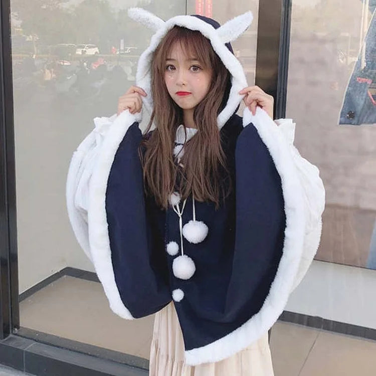 Women's hoodie with a kangaroo pocket and a pom - pom drawstring for added charmBunny Ears Delight: Three Quarter Sleeve Cloak Coat - Soft Cotton Hug for a Magical Look! ?? Women's hoodie with a kangaroo pocket and a pom - pom drawstring for added charmBunny Ears Delight: Three Quarter Sleeve Cloak Coat - Soft Cotton Hug for a Magical Look! ??