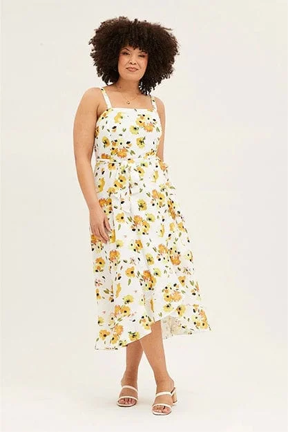 Midi dresses with geometric cutouts for a contemporary and edgy lookFloral Print Sleeveless Ruffle Midi Dress Midi dresses with geometric cutouts for a contemporary and edgy lookFloral Print Sleeveless Ruffle Midi Dress