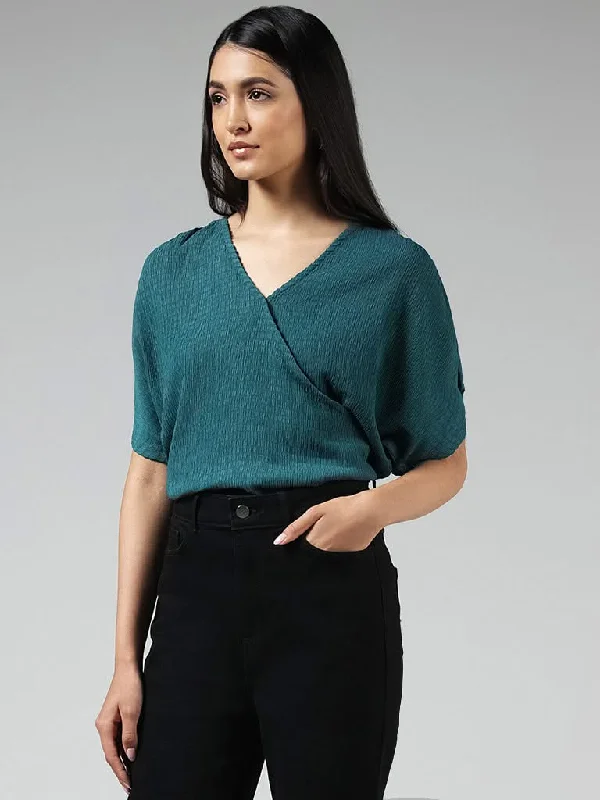 Women's pants for garden parties Colored women jeans in vibrant hues like red and yellow LOV Teal Surplice Neck Crepe Top Women's pants for garden parties Colored women jeans in vibrant hues like red and yellow LOV Teal Surplice Neck Crepe Top