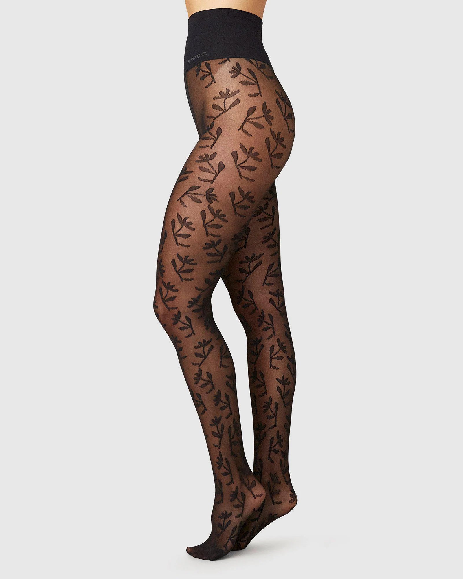 Ankle - length cuffed stockings for casual looksSwedish Stockings - Flora Flower Tights in Black Ankle - length cuffed stockings for casual looksSwedish Stockings - Flora Flower Tights in Black