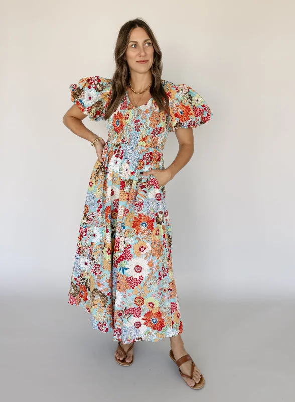 Maxi dresses with a criss - cross back for a flirty and unique detailArizona Smocked Maxi Dress - Final Sale Maxi dresses with a criss - cross back for a flirty and unique detailArizona Smocked Maxi Dress - Final Sale